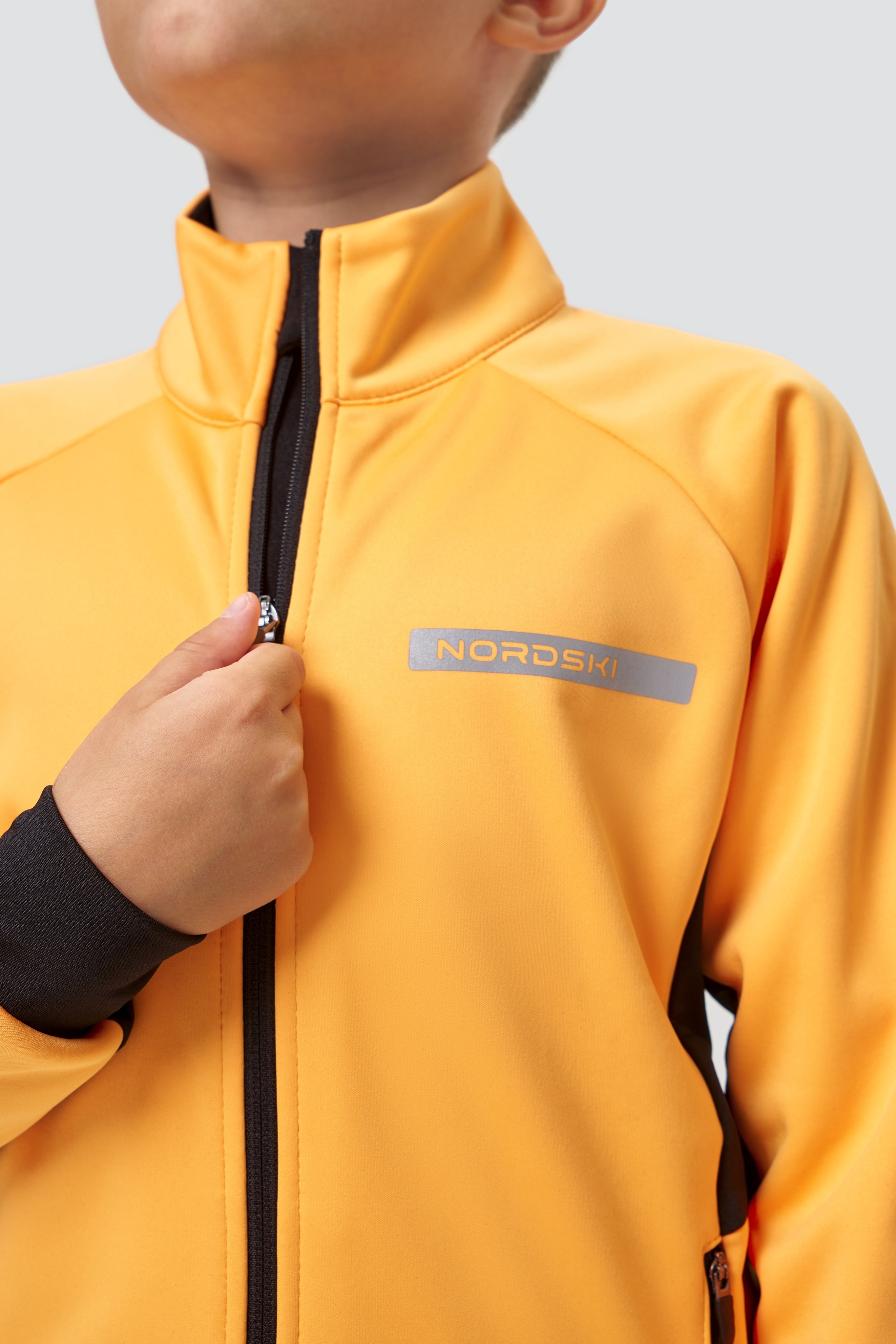 Детский лыжный разминочный костюм Nordski Jr Core orange-black - 8