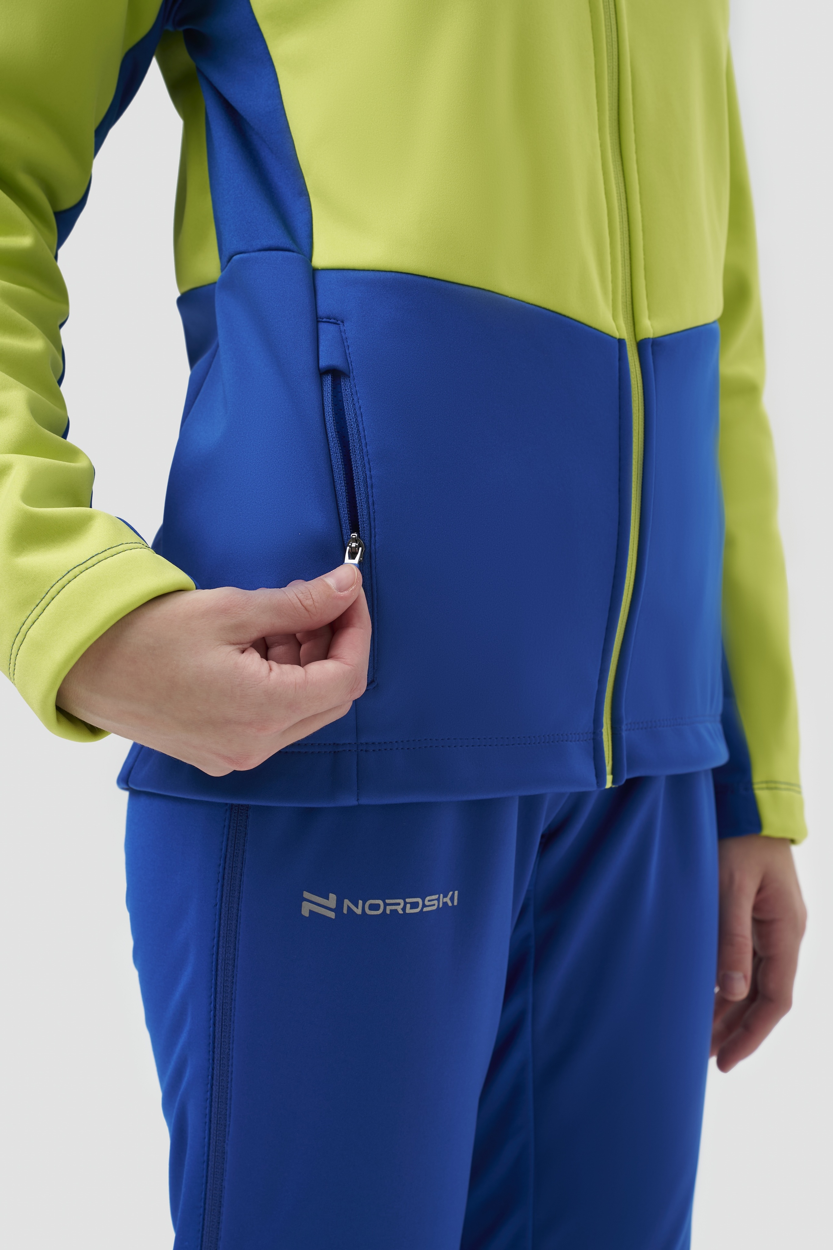 Детский тренировочный лыжный костюм Nordski Jr. Advance true blue-lime - 9